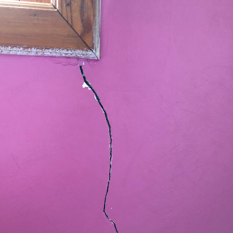 signs of foundation damage: crack in wall